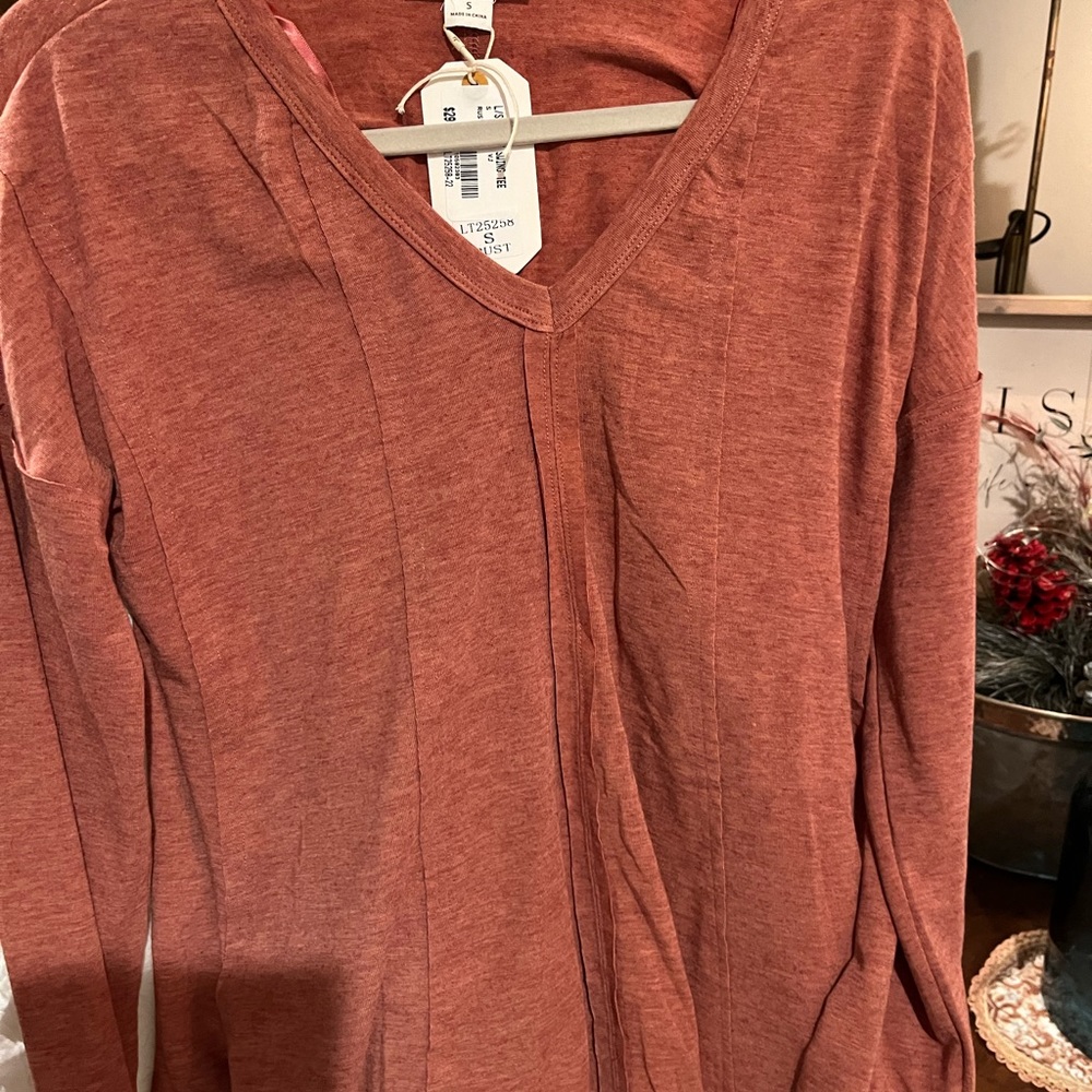 Sophisticated T shirt, size small, new with tags.